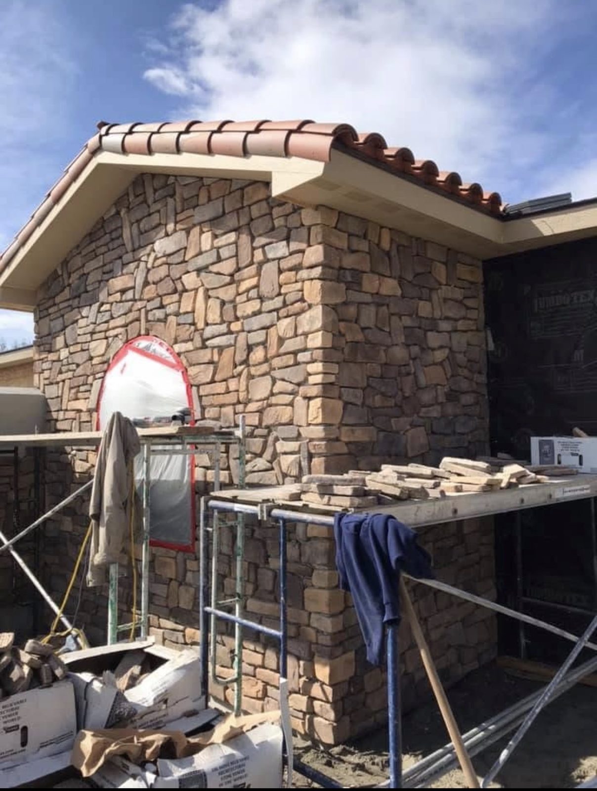Hand-set stone veneer wall with tight, even joints